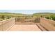 Balcony with brick flooring and mountain views at 27 Tamarade Dr, Littleton, CO 80127