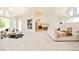 Bright main bedroom boasts vaulted ceilings, a fireplace, and an ensuite bathroom at 27 Tamarade Dr, Littleton, CO 80127