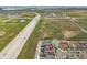Aerial view showcases the location of the townhomes near green space and convenient highway access at 847 Great Plains Ave, Berthoud, CO 80513