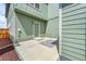 Back entrance patio area features a stylish outdoor rug, perfect for welcoming guests at 847 Great Plains Ave, Berthoud, CO 80513