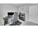 Bedroom featuring a gaming chair, modern shelving and decor at 847 Great Plains Ave, Berthoud, CO 80513