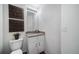 Half bathroom with modern fixtures and granite countertop at 46558 Avery Ln, Bennett, CO 80102