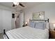 Comfortable bedroom featuring neutral tones, soft bedding and closet adding to the room's calm atmosphere at 635 Silver Rock Trl, Castle Rock, CO 80104