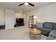 Upstairs living area features comfortable seating and entertainment setup at 635 Silver Rock Trl, Castle Rock, CO 80104