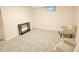 Finished basement featuring neutral walls, carpet and natural light from a window at 245 Miller Ave, Brighton, CO 80601