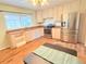 Updated kitchen with stainless steel appliances, countertops, and natural light at 245 Miller Ave, Brighton, CO 80601