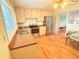 Updated kitchen with stainless steel appliances, countertops, and natural light at 245 Miller Ave, Brighton, CO 80601