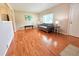Inviting living room with natural light and hardwood floors at 245 Miller Ave, Brighton, CO 80601