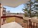 Private balcony with distant views and planters at 12565 Sheridan Blvd # 208, Broomfield, CO 80020