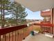 Private balcony with treetop and distant views at 12565 Sheridan Blvd # 208, Broomfield, CO 80020