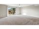 Spacious living room with access to balcony at 12565 Sheridan Blvd # 208, Broomfield, CO 80020