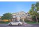 Charming condo building with well-manicured landscaping, balconies, and parking at 5726 N Genoa Way # 301, Aurora, CO 80019