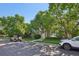 Inviting townhouse complex with well-maintained landscaping and ample parking at 5726 N Genoa Way # 301, Aurora, CO 80019