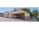 Garage features ample storage and parking space with an SUV inside at 5726 N Genoa Way # 301, Aurora, CO 80019