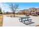 Community park with picnic tables and open green space at 5726 N Genoa Way # 301, Aurora, CO 80019