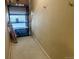 Storage room with shelving, ladder and peach-colored walls at 5726 N Genoa Way # 301, Aurora, CO 80019