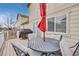 Outdoor back deck with patio furniture, a grill, and sunny sky views at 6414 Stuart St, Arvada, CO 80003