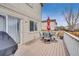 Enjoy outdoor dining on the deck, featuring a patio set and grill, perfect for entertaining or relaxing at 6414 Stuart St, Arvada, CO 80003