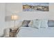 Serene main bedroom featuring a lamp on a nightstand at 6414 Stuart St, Arvada, CO 80003