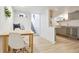 Finished basement with dining space, built-in seating, and modern kitchen area at 109 W Simpson St, Lafayette, CO 80026
