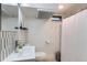 Modern bathroom featuring tiled wall, sleek fixtures, and a shower with curtain at 109 W Simpson St, Lafayette, CO 80026