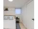 Cozy bedroom with a comfortable bed, ambient lighting, and practical built-in storage at 109 W Simpson St, Lafayette, CO 80026