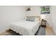 Comfortable bedroom with a full bed, bedside table and a gray area rug at 109 W Simpson St, Lafayette, CO 80026