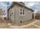 Charming home exterior with a well-maintained stucco finish, complemented by string lights at 109 W Simpson St, Lafayette, CO 80026