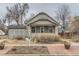 Charming single-story home featuring a cozy front porch and low-maintenance landscaping at 109 W Simpson St, Lafayette, CO 80026