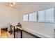 Hallway nook with natural light from 3 windows and a compact work space at 109 W Simpson St, Lafayette, CO 80026