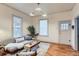 Comfortable living room with hardwood flooring, plenty of natural light, and a cozy atmosphere at 109 W Simpson St, Lafayette, CO 80026