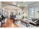 Open living space with hardwood floors and stylish decor including a sofa and coffee table at 109 W Simpson St, Lafayette, CO 80026