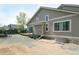 Expansive backyard features a patio area and views of the side of the home at 9768 Otis Dr, Broomfield, CO 80021