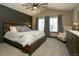 Calm primary bedroom with vaulted ceiling, carpet, and decorative fan at 9768 Otis Dr, Broomfield, CO 80021