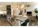 Open concept kitchen with a large kitchen island, stainless steel appliances and lots of natural light at 9768 Otis Dr, Broomfield, CO 80021