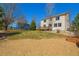The spacious back yard features a deck, patio, and lawn at 7661 Chickaree Ct, Littleton, CO 80125