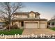 Charming two-story home featuring a three-car garage and covered porch at 7661 Chickaree Ct, Littleton, CO 80125