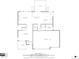Detailed floor plan showcasing the layout of the living room, dining area, kitchen, garage, and porch at 7661 Chickaree Ct, Littleton, CO 80125