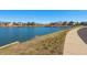 Scenic water view of the community's lake with the sidewalk at 7661 Chickaree Ct, Littleton, CO 80125
