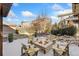Fire pit and seating area on backyard patio at 15980 Pikes Peak Dr, Broomfield, CO 80023