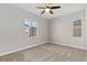 Bright bedroom featuring carpet and ceiling fan at 15980 Pikes Peak Dr, Broomfield, CO 80023