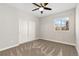 Spacious bedroom with double door closet and carpet at 15980 Pikes Peak Dr, Broomfield, CO 80023