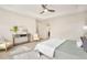 Bright main bedroom with a ceiling fan, soft carpet, comfortable seating, and a neutral color palette for rest at 15980 Pikes Peak Dr, Broomfield, CO 80023