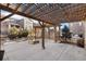Covered patio with fire pit and pergola at 15980 Pikes Peak Dr, Broomfield, CO 80023