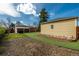 Landscaped backyard with artificial turf, rock garden, and covered patio, perfect for enjoying the outdoors at 1386 S Garfield St, Denver, CO 80210