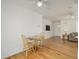 Dining area featuring hardwood floors and seating for two at 1386 S Garfield St, Denver, CO 80210