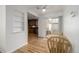 Dining area flows into kitchen and features sliding door access to patio at 1386 S Garfield St, Denver, CO 80210