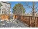 Cozy back deck with a grill, outdoor seating, and a serene backyard setting at 2116 W 101St Cir, Thornton, CO 80260