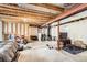 Unfinished basement with exposed beams, offering a large space and a chance for personalization at 2116 W 101St Cir, Thornton, CO 80260