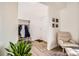 Bright entryway with high ceilings, wood floors, and coat rack at 2116 W 101St Cir, Thornton, CO 80260